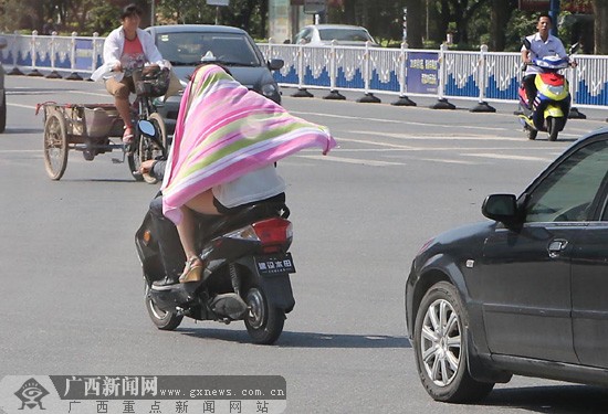 南宁城市热岛效应等级达4级 市民要当热岛岛主了