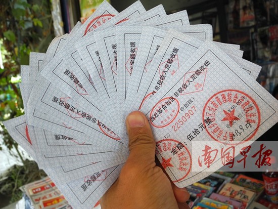 南宁个别报刊亭经营户获千元补偿 城管称执法