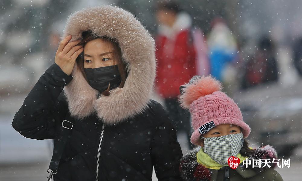 三九尾日沈阳漫天飘雪似柳絮