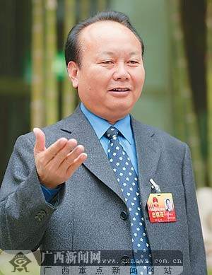 覃远通市庆十周年力争三跨越