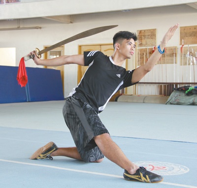 准备参加东南亚运动会的菲律宾国家武术队队员在进行训练.孙广勇摄