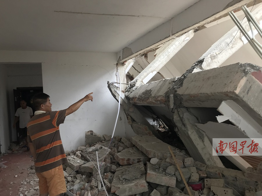 6月24日焦点图:居民楼被拆迁房砸穿