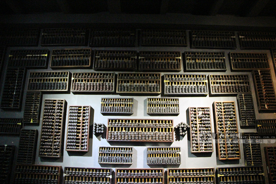 一面"算盘"墙.广西新闻网实习生 李焕霖 摄